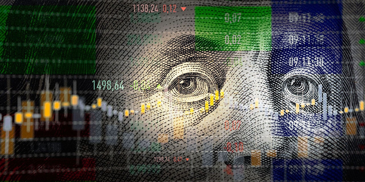 Closeup image of a 100-dollar bill with a graph overlaid.