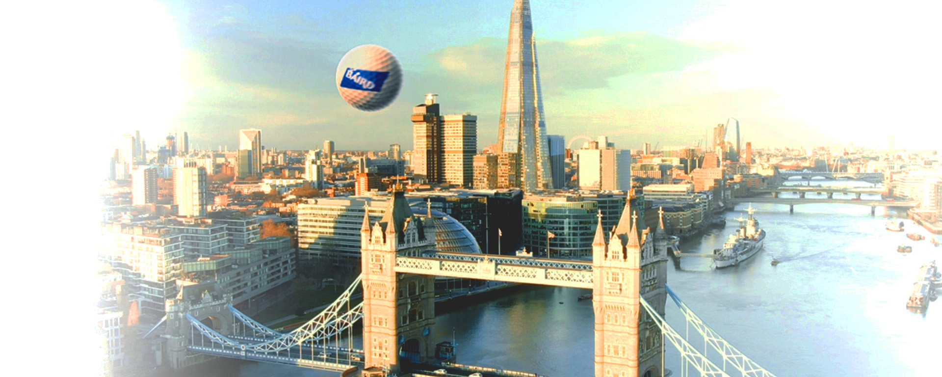 Baird golf ball flyer over bridge in London.