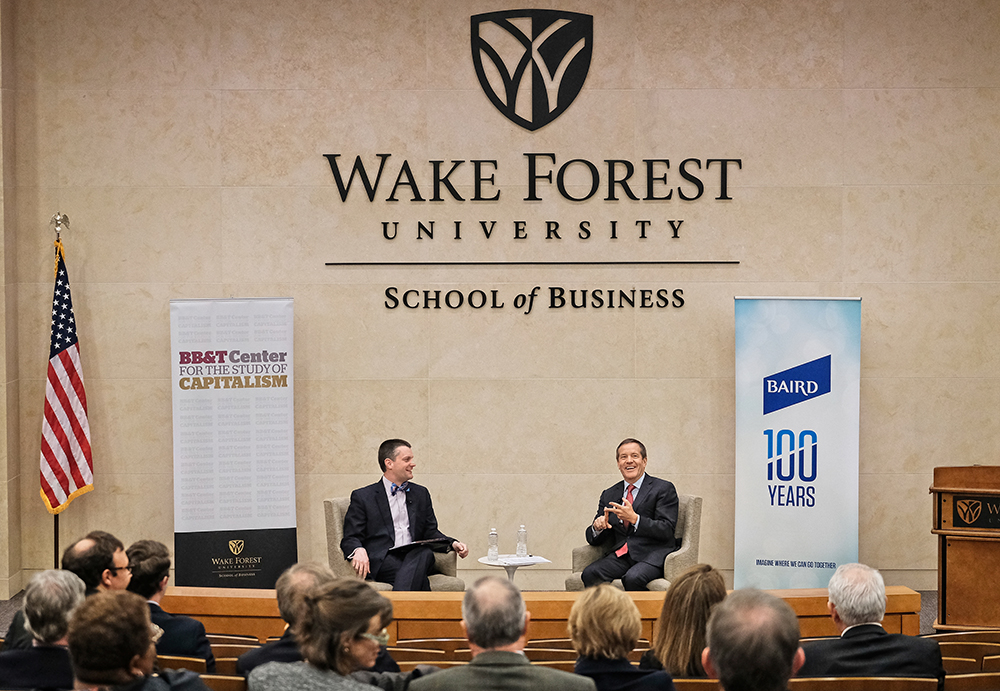 Taft (right) addresses attendees at the Wake Forest University School of Business on April 2 in North Carolina. 