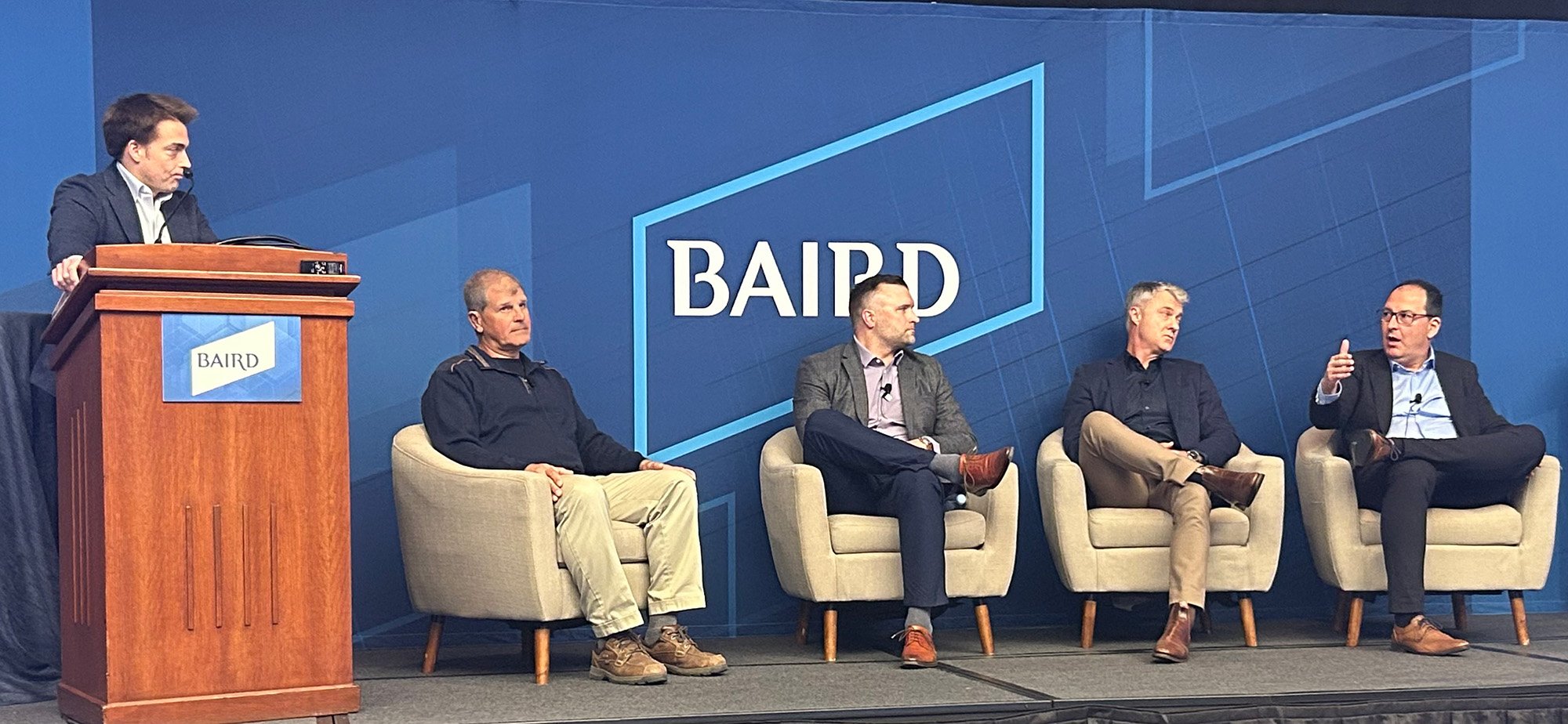Joe Vruwink moderates a panel discussion with James Balzary, Joe Bellini, Stefan Jesse, and Josh Roberts at Baird's Annual Global Industrial Conference