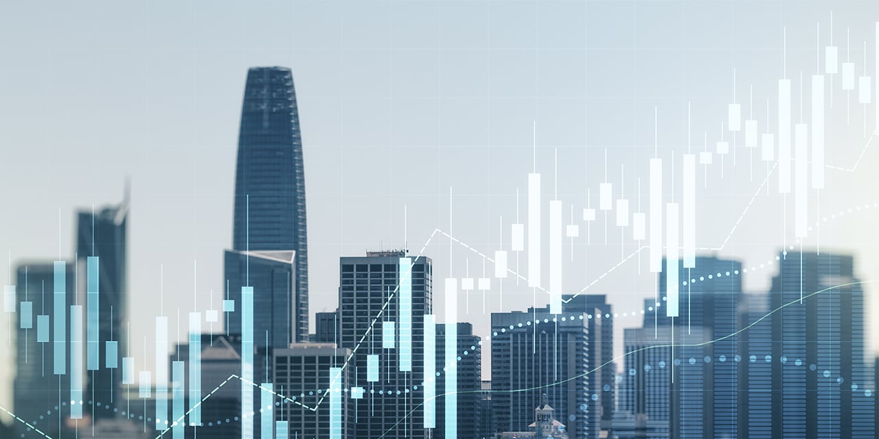 City skyline with line graphs overlaid.