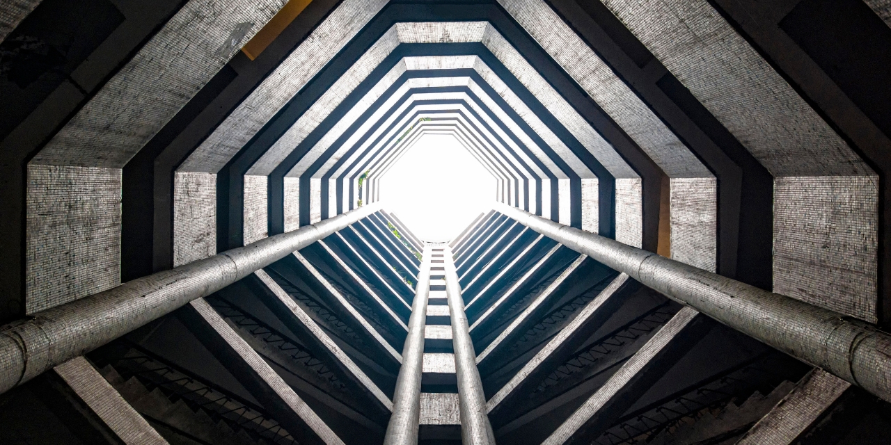 View through an octagonal, concrete tunnel