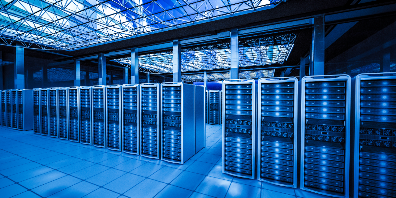 Modern data center with rows of illuminated server racks supporting secure digital infrastructure.