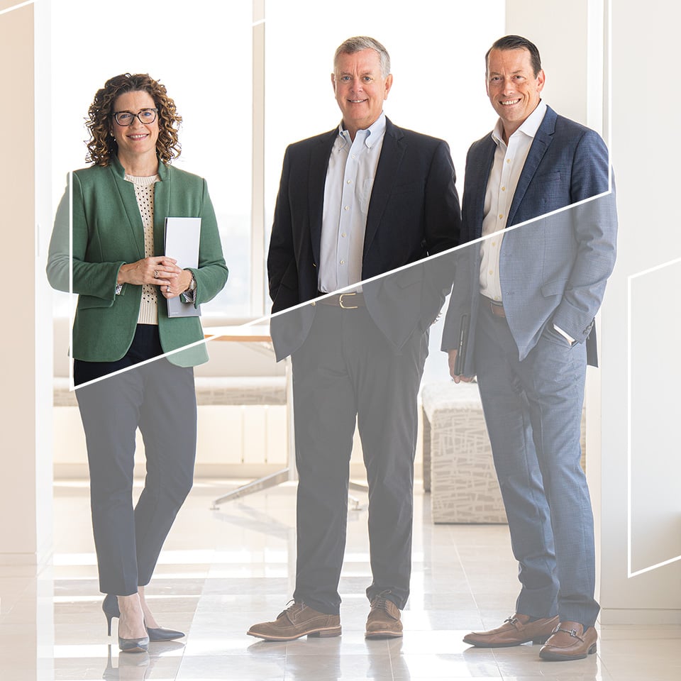 3 associates from Baird Private Wealth Management in an office setting