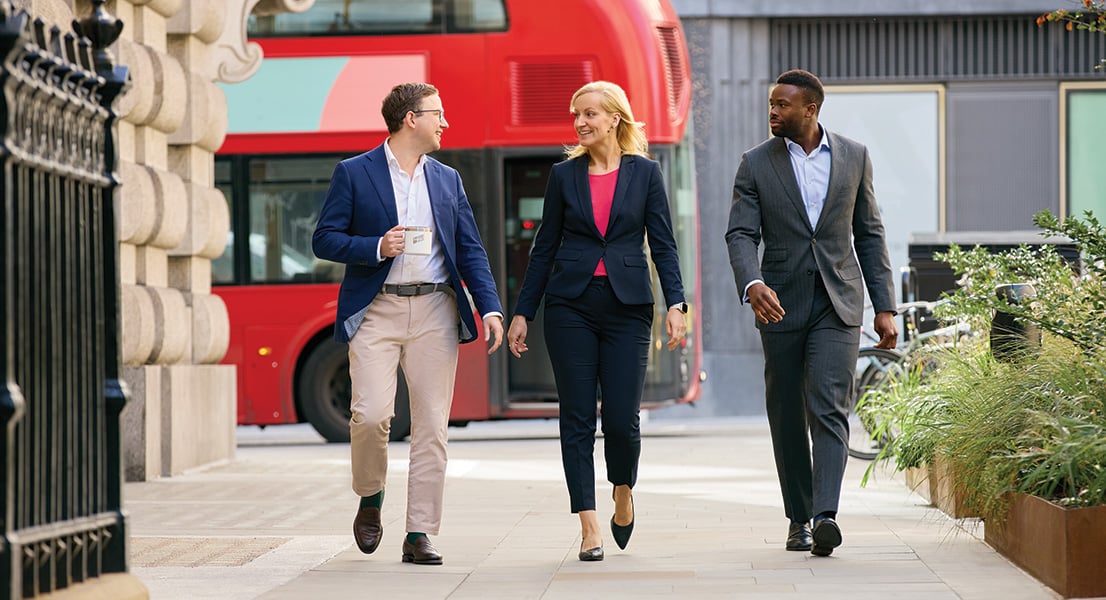 Three associates from Baird Principal Investments walking outside the London office