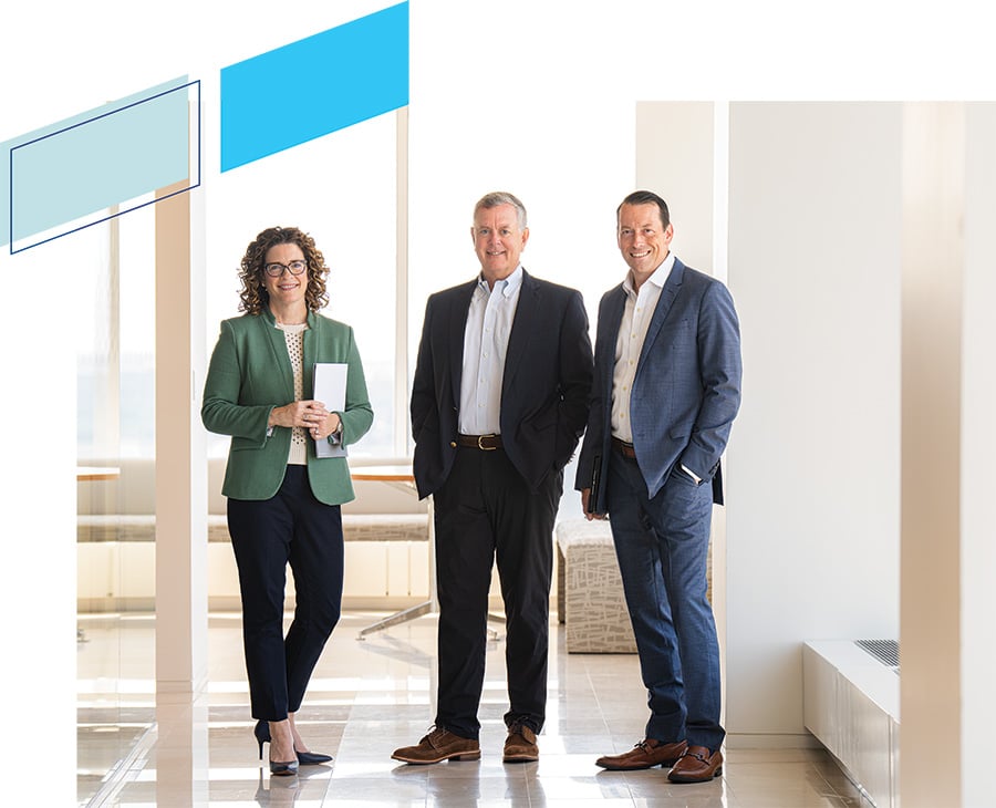 3 associates from Baird Private Wealth Management in an office setting