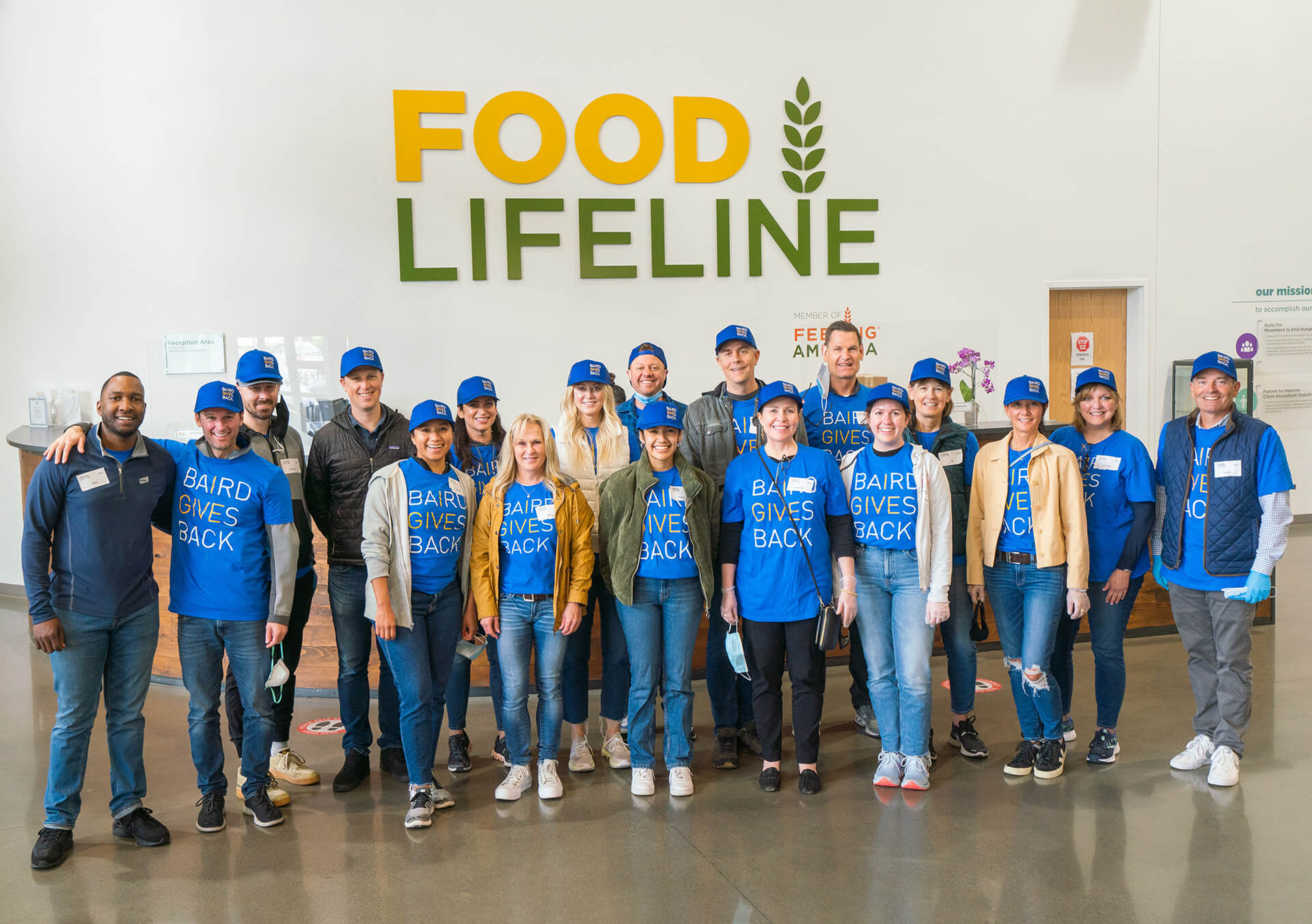 A group of Baird associates volunteering at Food Lifeline