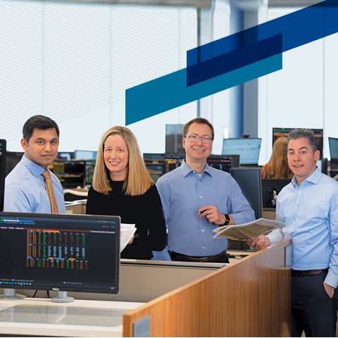 Four members of the Asset Management team on the trading floor