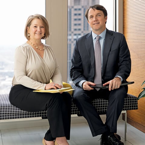 A photo of two associates from the Fixed Income Capital Markets team