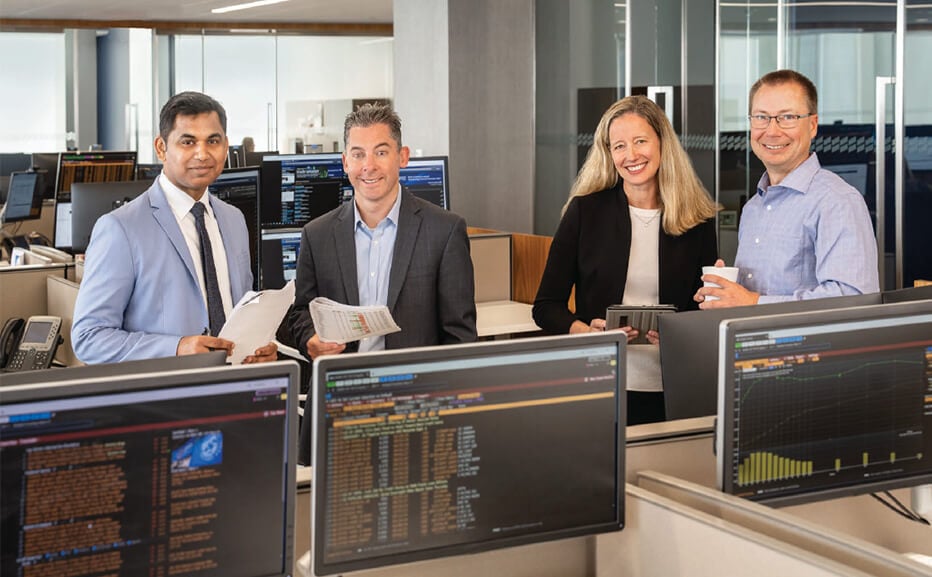 Four members of the Baird Asset Management team