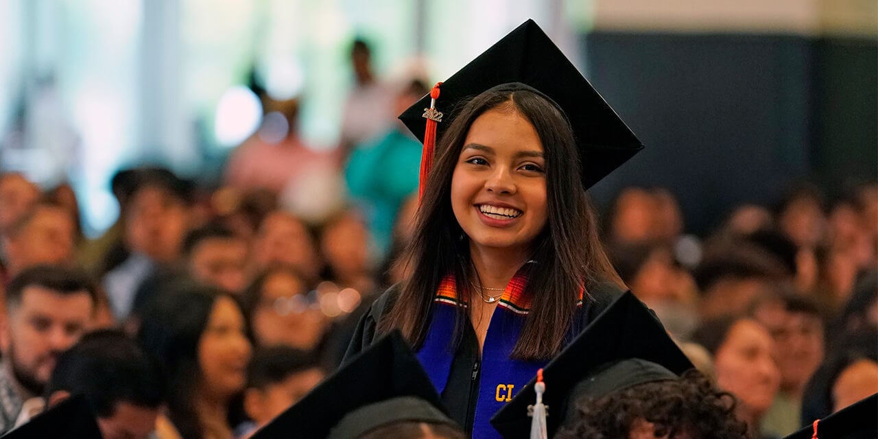 Student in graduation cap and gown